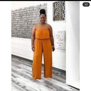 Women jumpsuit size Medium (color ginger) brand new never worn